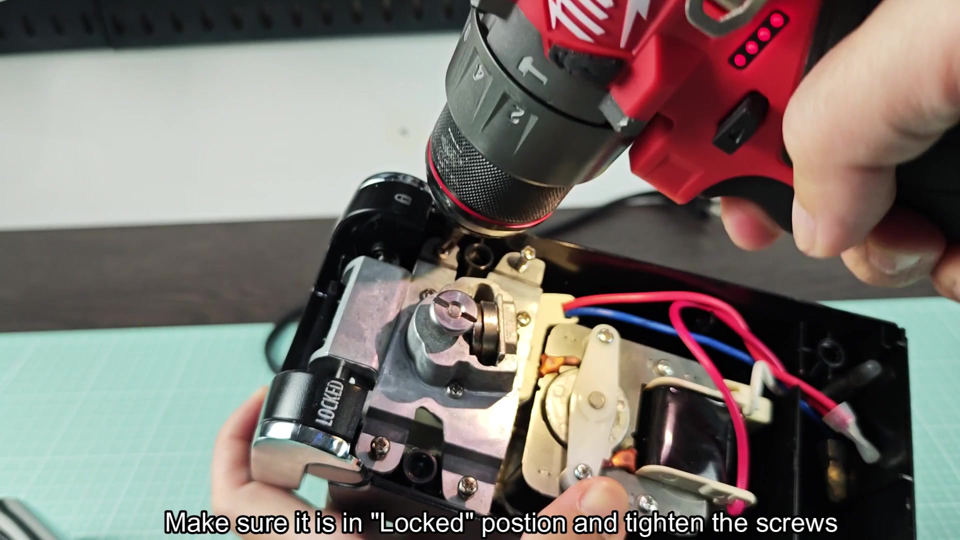 Power driver securing screw on open can opener Power driver securing screw on open can opener