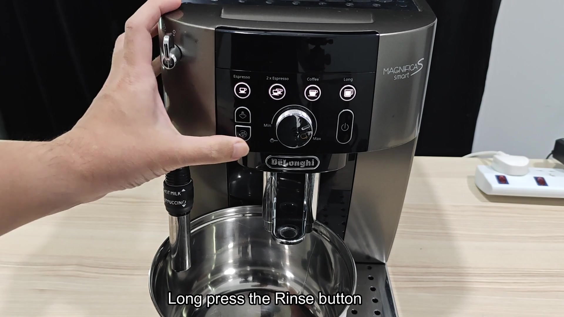 Press and hold the rinse button Press and hold the rinse button