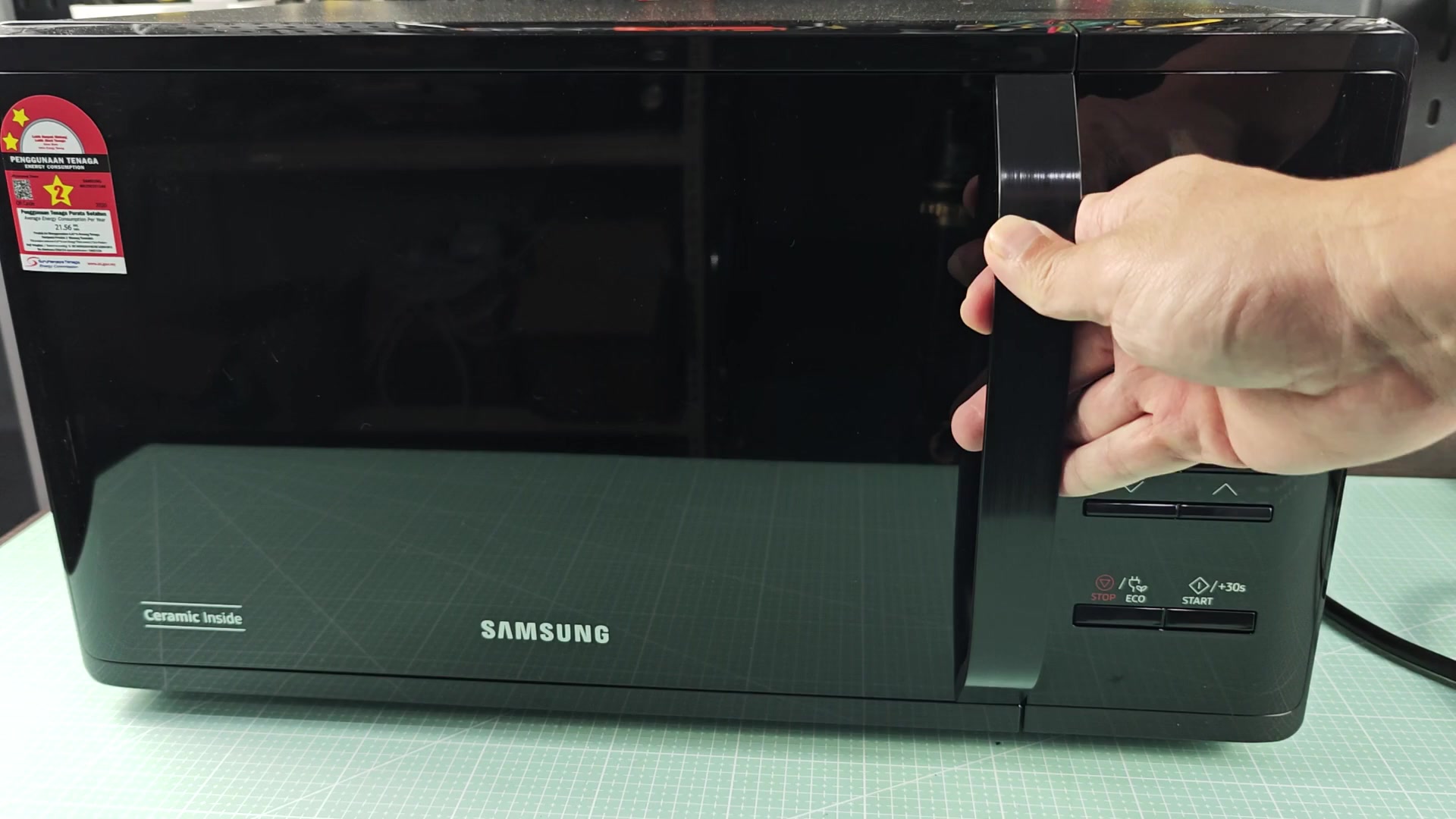 Pressing child lock button on microwave Pressing child lock button on microwave