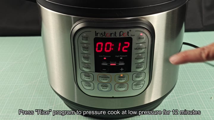 Pressing Rice button for 12 minutes Pressing Rice button for 12 minutes