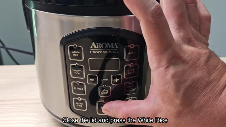 Pressing the White Rice button Pressing the White Rice button