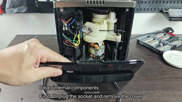 Removing cover to clean internal components Removing cover to clean internal components