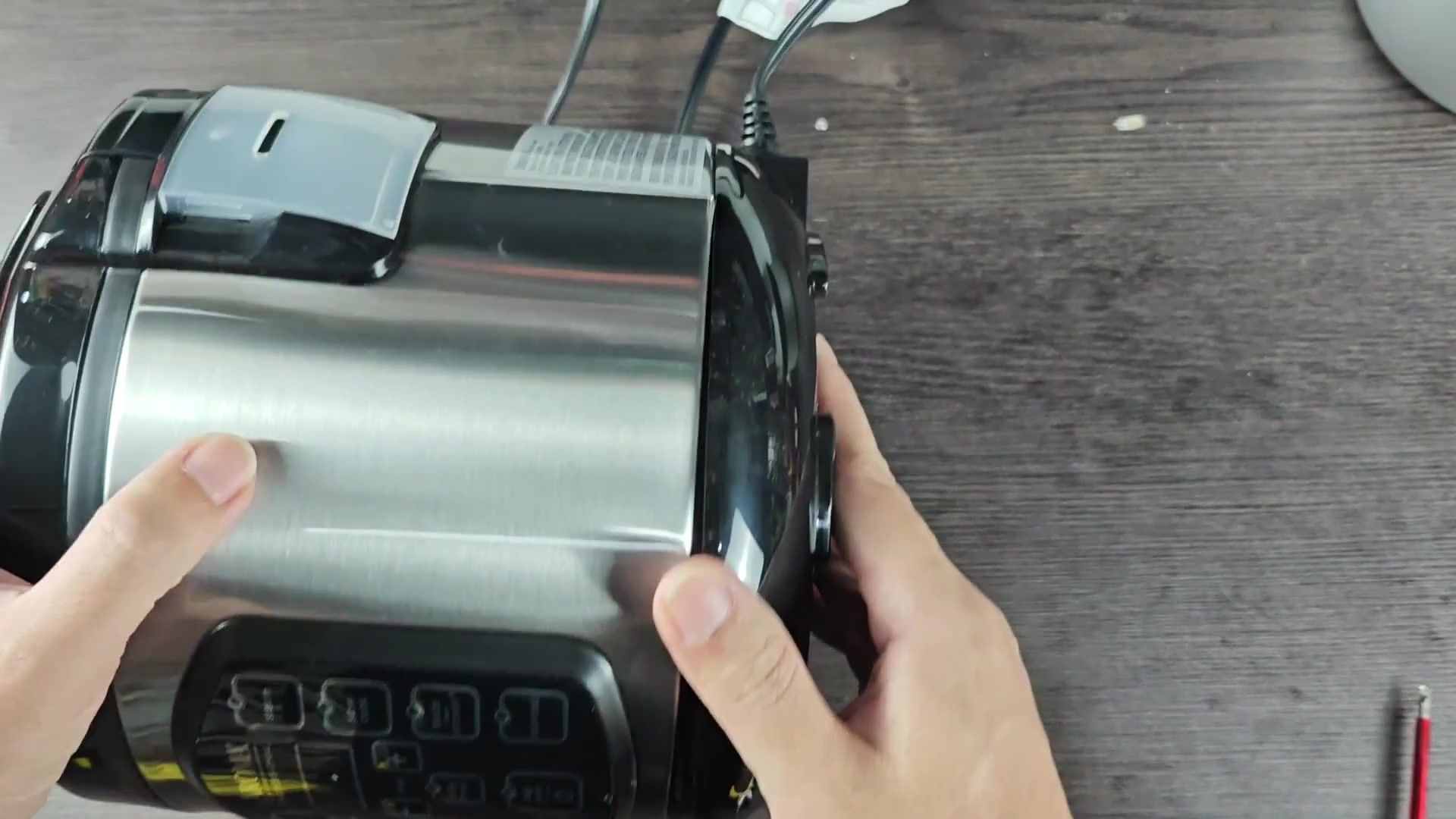 Removing power cord entry cover tab Removing power cord entry cover tab