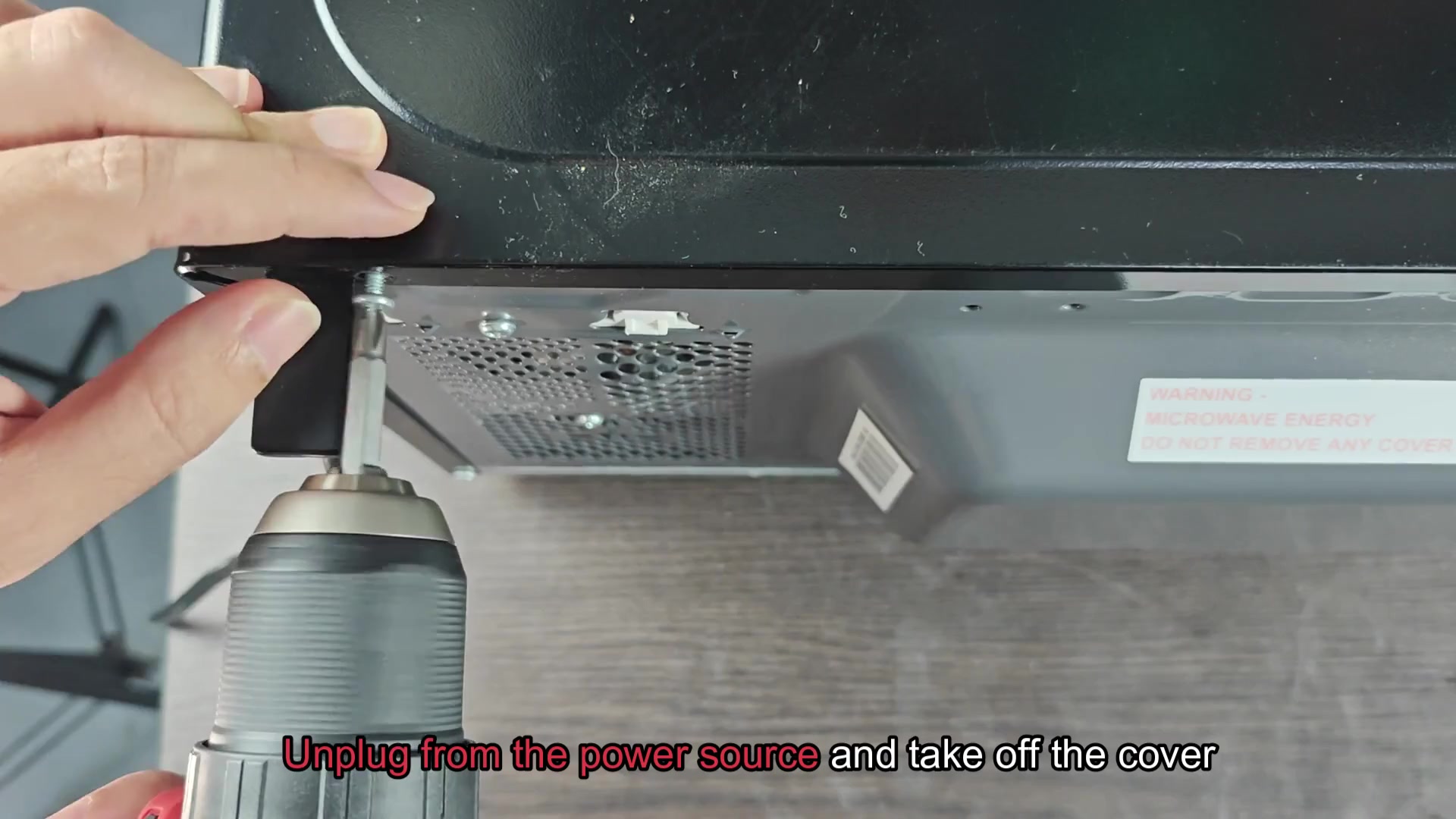 Removing screw to access cover Removing screw to access cover