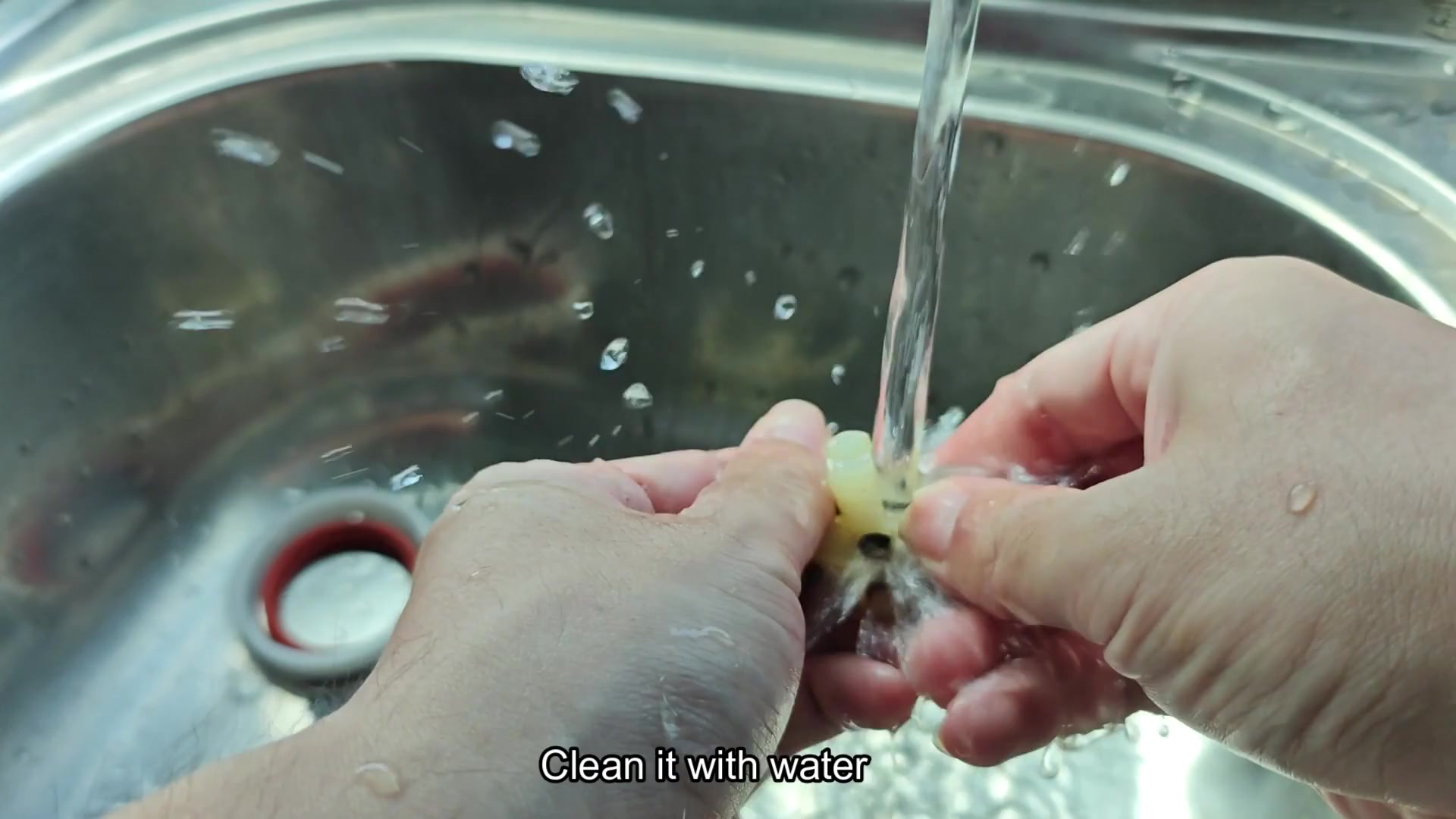 Rinsing plastic component with water Rinsing plastic component with water