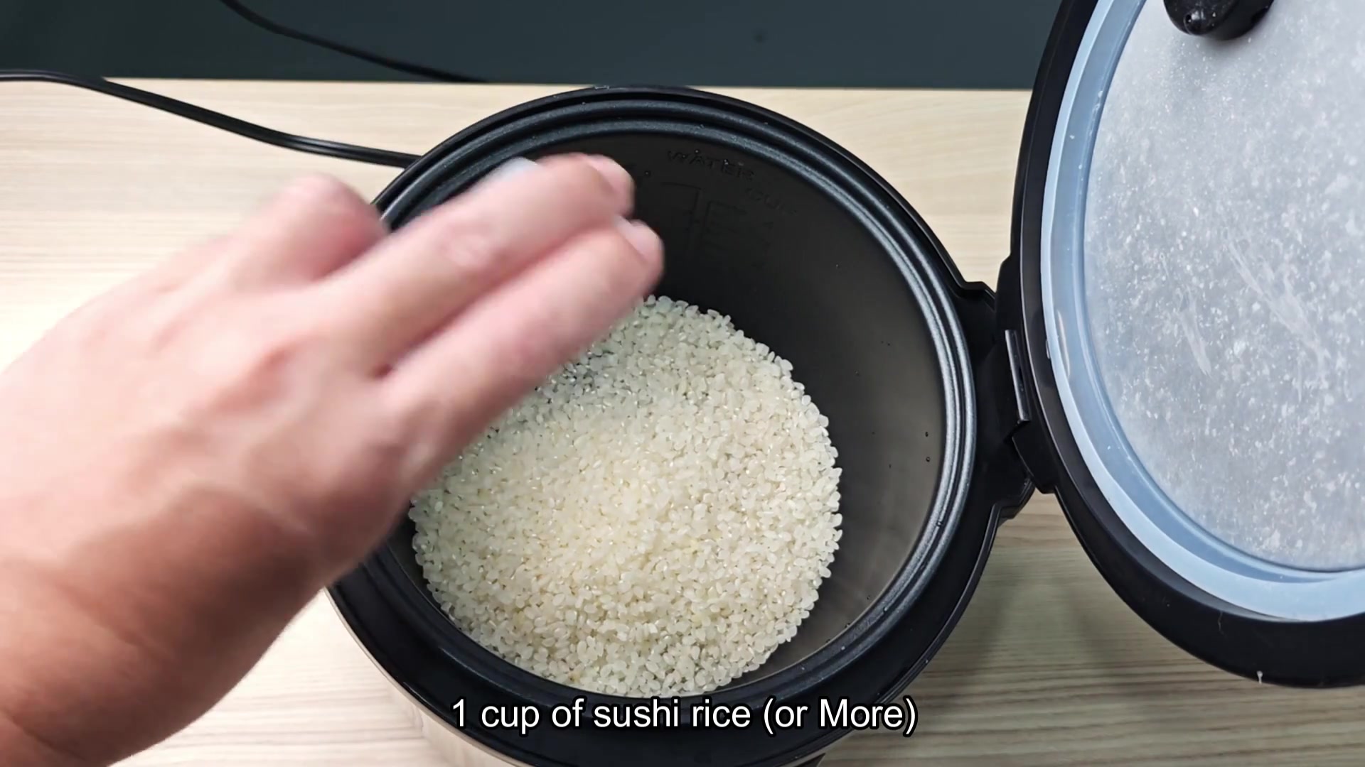 Rinsing rice until water runs clear Rinsing rice until water runs clear