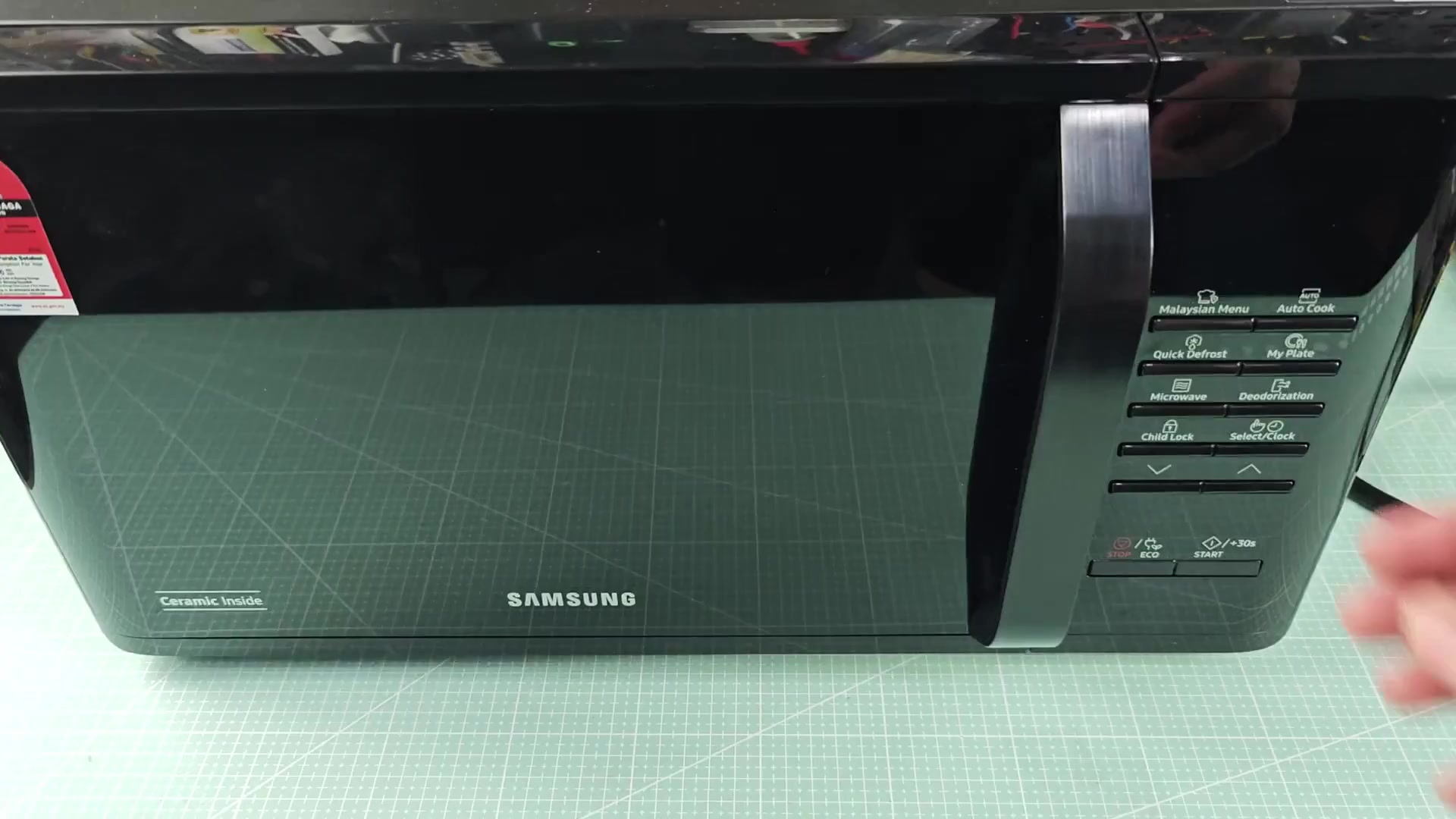Samsung microwave on green cutting mat Samsung microwave on green cutting mat
