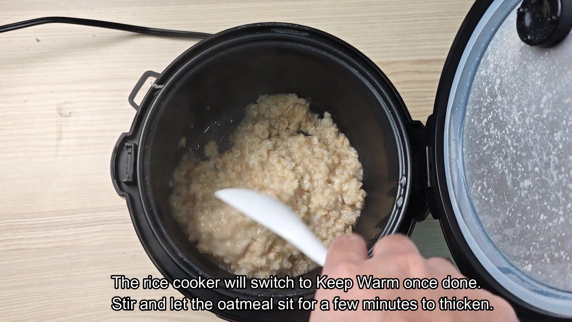 Stirring the thickened oatmeal inside Stirring the thickened oatmeal inside