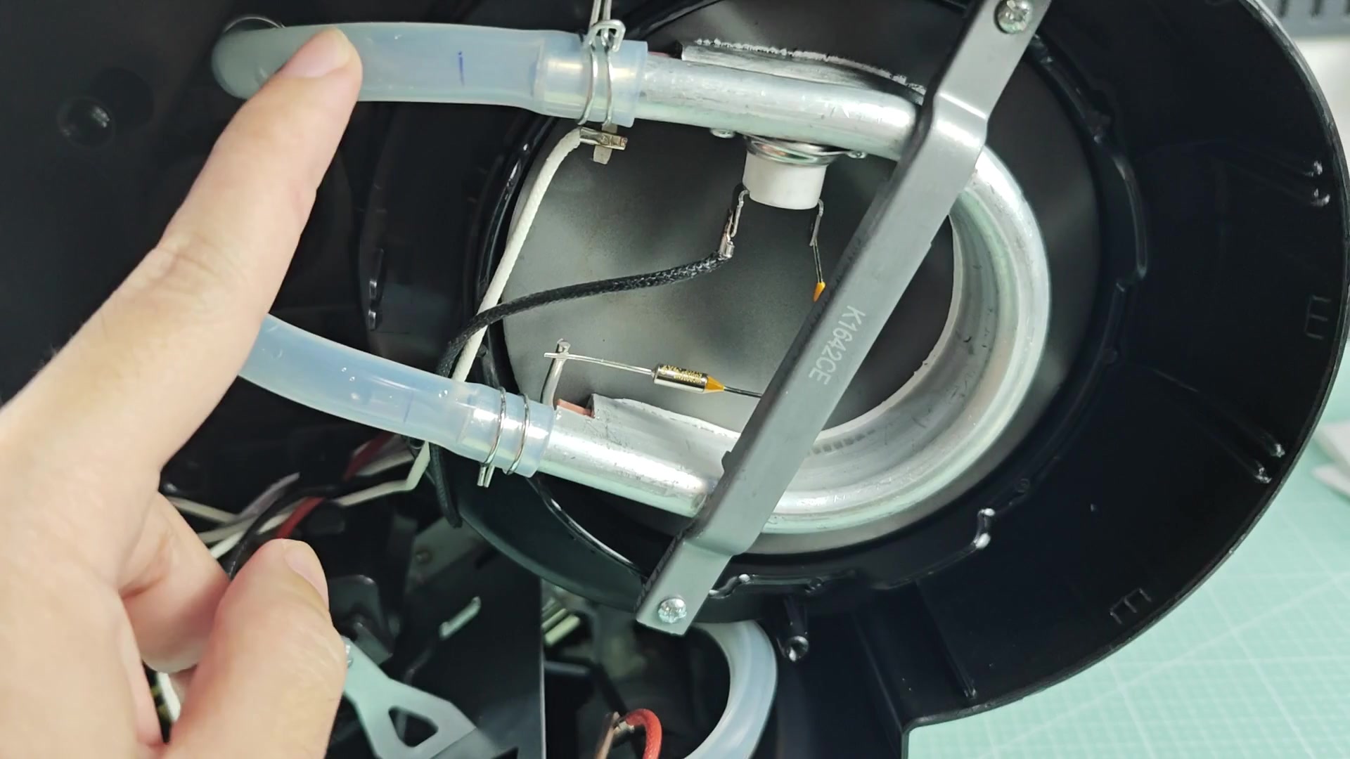 Transparent tube connection inside housing Transparent tube connection inside housing