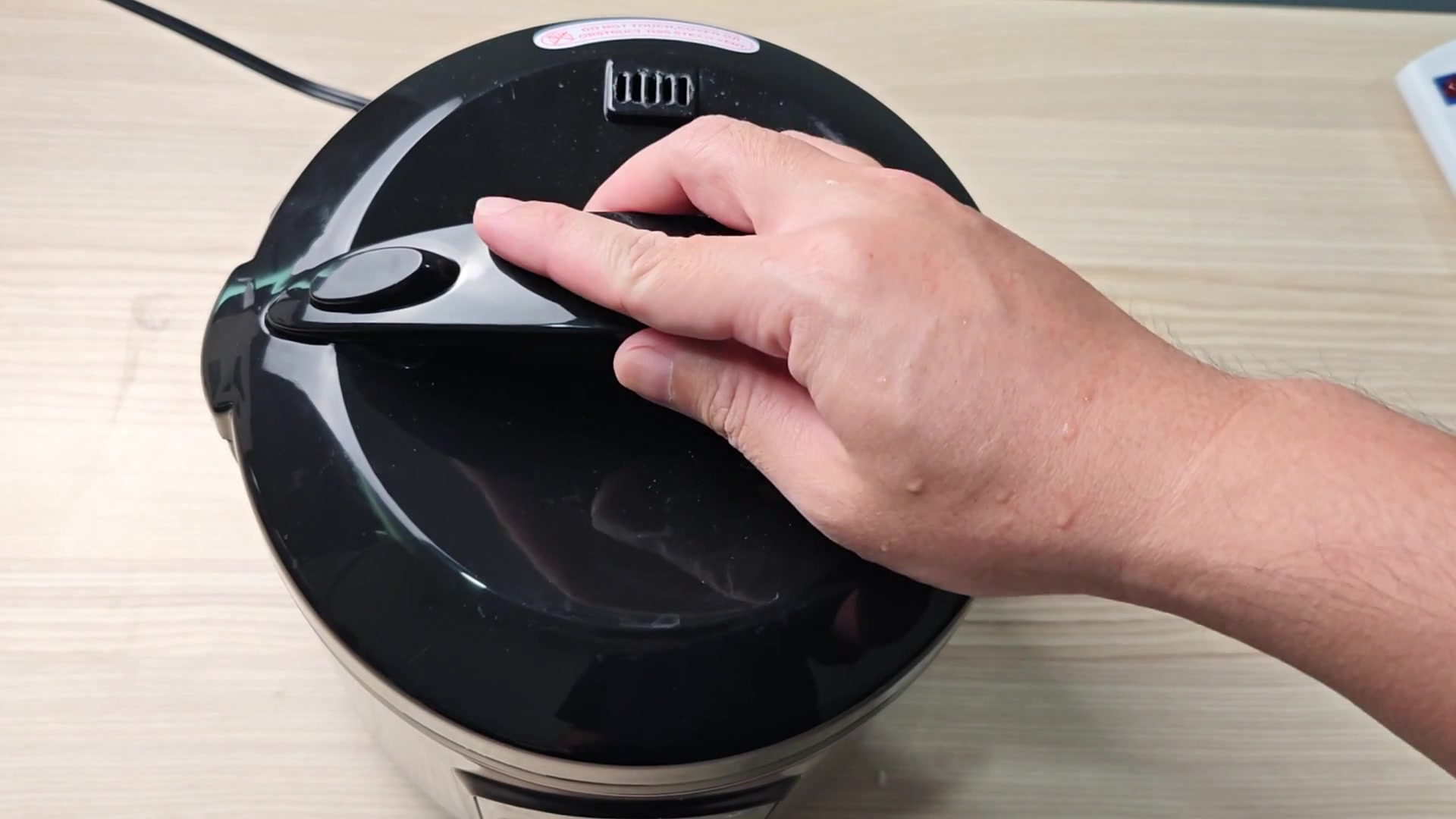 Uncooked basmati rice in open cooker Uncooked basmati rice in open cooker
