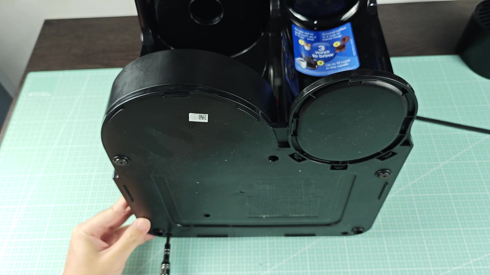 Underside of coffee maker on mat Underside of coffee maker on mat