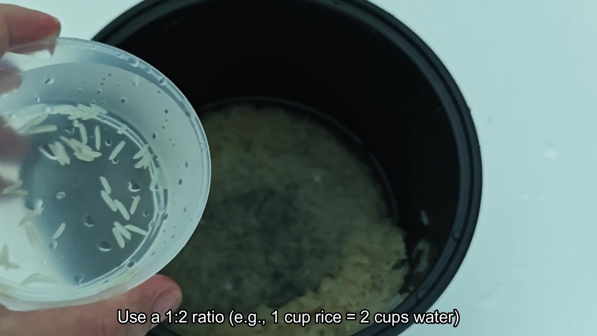 Washing rice until water runs clear Washing rice until water runs clear
