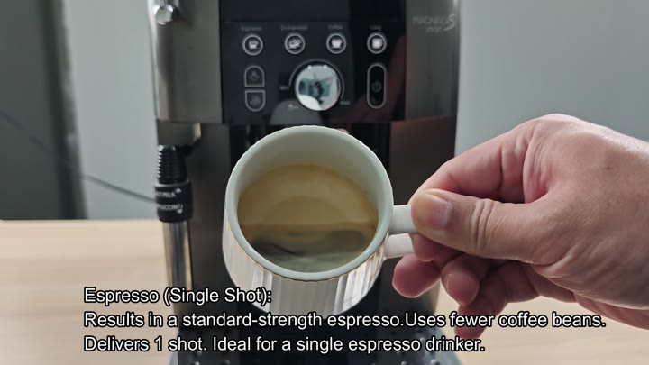 White cup filled with single espresso shot White cup filled with single espresso shot