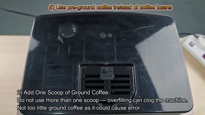 Adding pre-ground coffee scoop to machine Adding pre-ground coffee scoop to machine