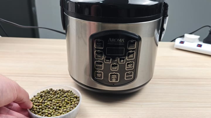 Aroma rice cooker on wooden counter Aroma rice cooker on wooden counter