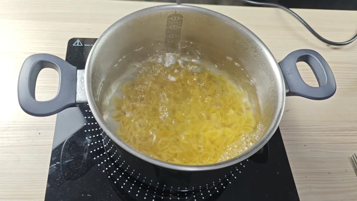 Boiling ring pasta in pot Boiling ring pasta in pot