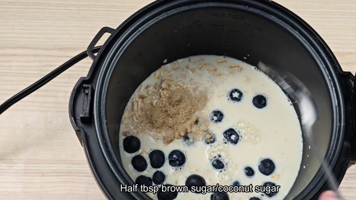 Brown sugar mixed into oatmeal Brown sugar mixed into oatmeal