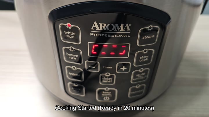 Display shows cooking started message Display shows cooking started message
