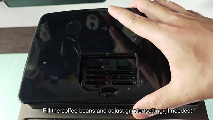 Fill bean hopper and adjust grinder Fill bean hopper and adjust grinder