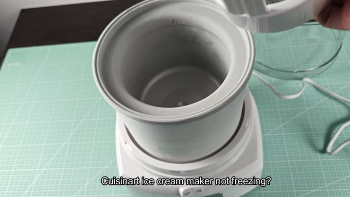 Ice cream maker revealing inner freezing bowl Ice cream maker revealing inner freezing bowl