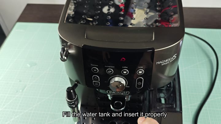 Insert water tank into De'Longhi machine Insert water tank into De'Longhi machine