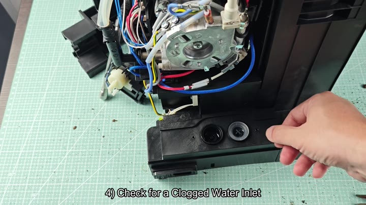 Inspecting internal water inlet for clogs Inspecting internal water inlet for clogs