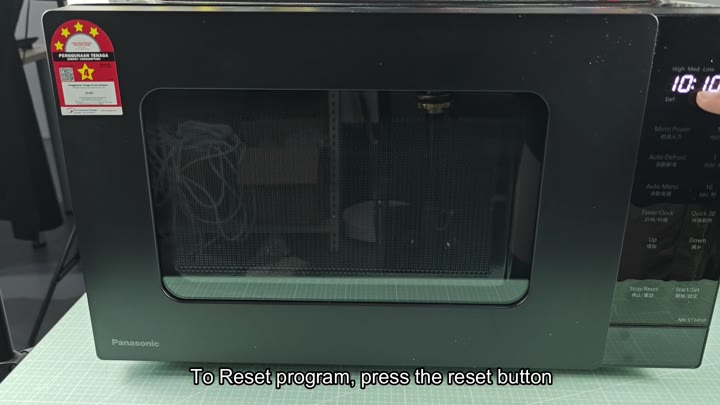 Microwave display showing time and model Microwave display showing time and model