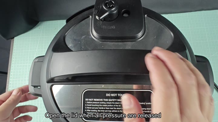 Opening lid after pressure releases Opening lid after pressure releases