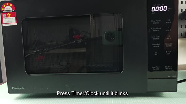 Panasonic microwave display showing 00:00 Panasonic microwave display showing 00:00