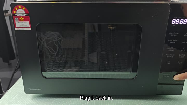 Plug microwave back into power outlet Plug microwave back into power outlet
