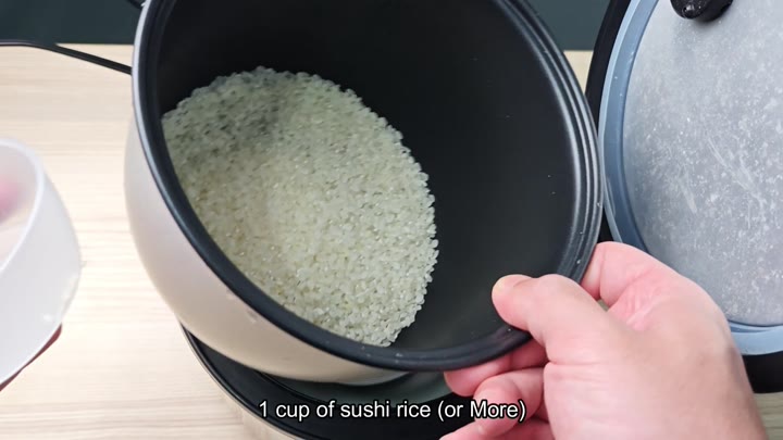 Pot with uncooked sushi rice Pot with uncooked sushi rice