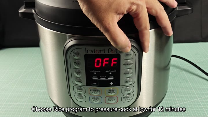 Pressing Instant Pot lid to seal Pressing Instant Pot lid to seal