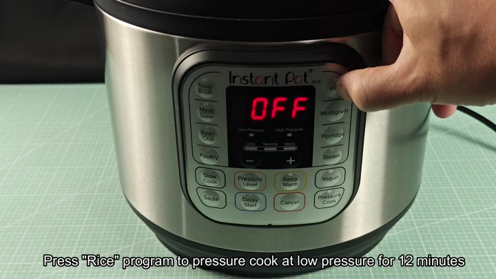 Pressing Rice button to start Pressing Rice button to start