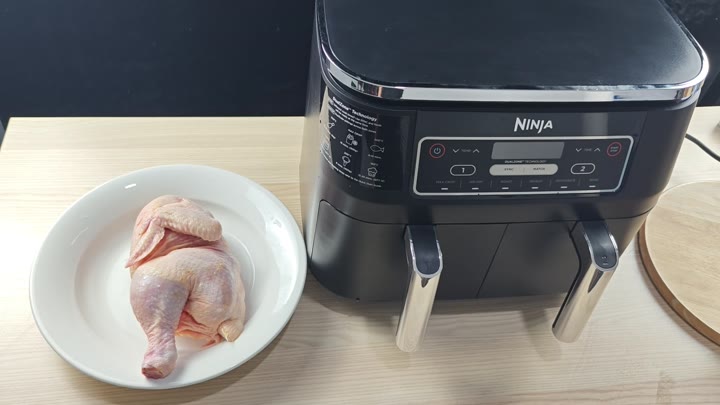 Raw chicken next to Ninja air fryer Raw chicken next to Ninja air fryer
