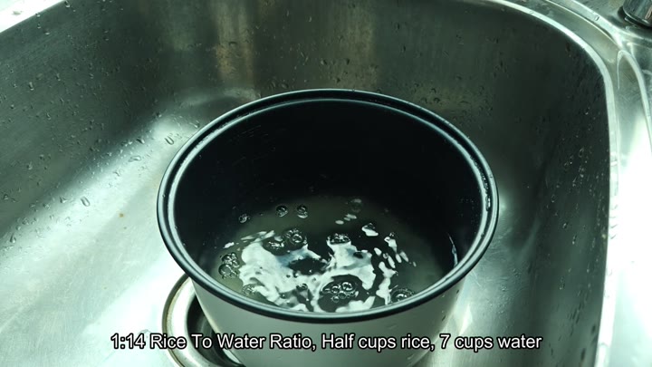 Rice and water in pot Rice and water in pot