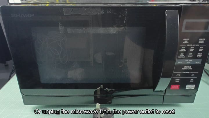 Sharp microwave with UK plug attached Sharp microwave with UK plug attached