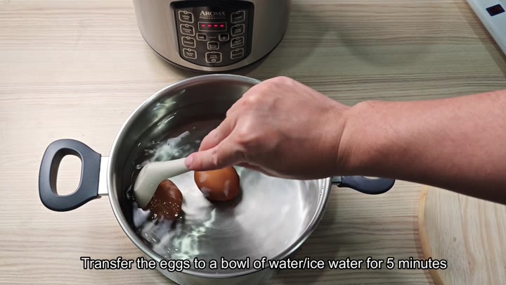 Transferring eggs to ice water bath Transferring eggs to ice water bath