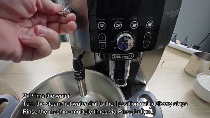Turning dial to prime water system Turning dial to prime water system