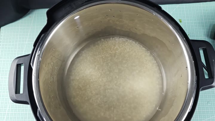 Uncooked rice submerged in water in Instant Pot Uncooked rice submerged in water in Instant Pot