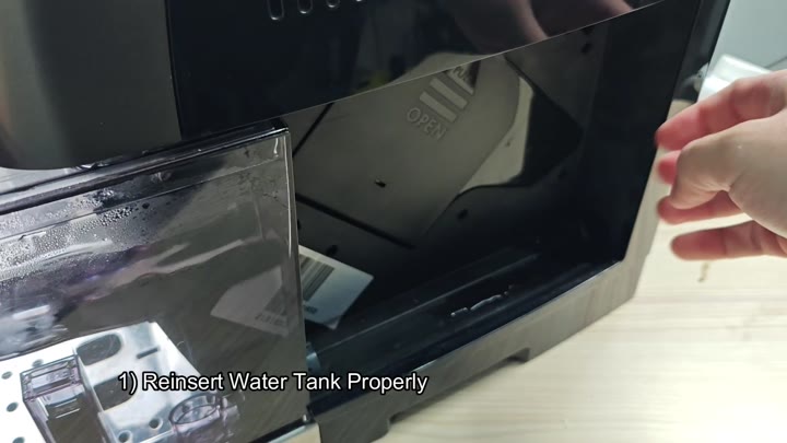Water tank reinserted into compartment Water tank reinserted into compartment