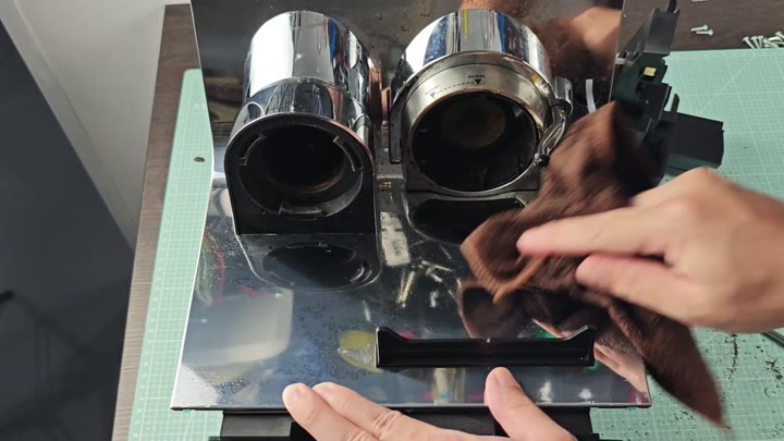 Wiping chrome cylinder parts with cloth Wiping chrome cylinder parts with cloth